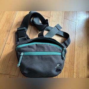 Mountain Smith pack. Small & convenient. Crossbody or waist wear. Many pockets.